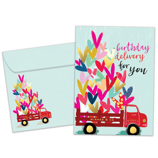 Front view of a Birthday greeting card featuring an illustration of a delivery truck filled with hearts, with a matching envelope.