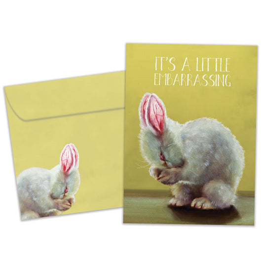 Front view of a Birthday greeting card featuring a bunny covering its face with the message "It's a little embarrassing", with a matching envelope.