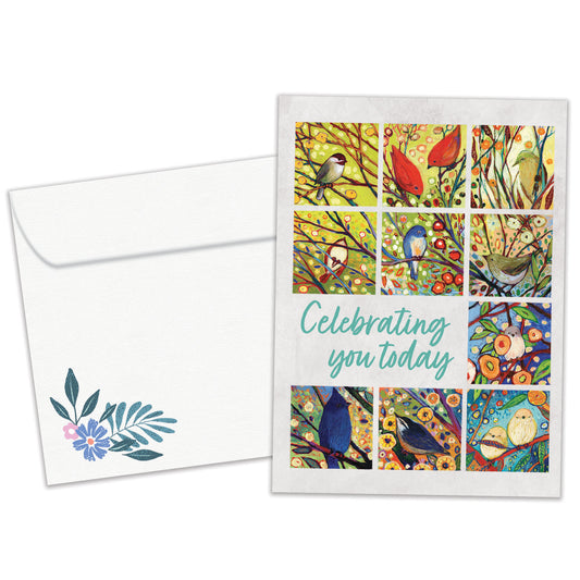 Front view of a Birthday greeting card featuring colorful birds and flowers with a celebration message, with a matching envelope.