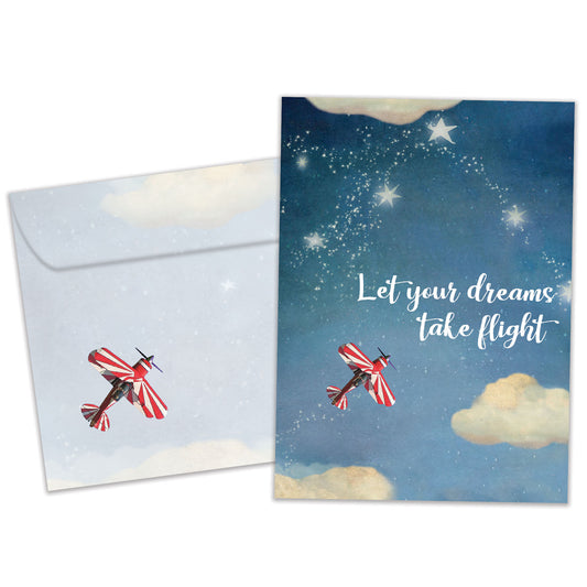 Front view of a Birthday greeting card featuring an airplane flying in the sky with the message "let your dreams take flight", with a matching envelope.