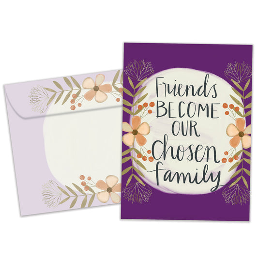 Front view of a birthday greeting card featuring the message "friends become our chosen family" surrounded by flowers on a purple background, with a matching envelope.