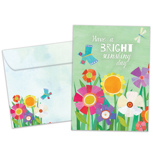 Front view of a birthday greeting card featuring the message "have a bright sunshiny day" surrounded by flowers, with a matching envelope.