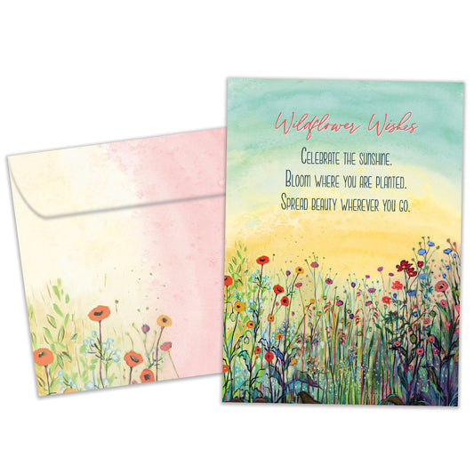 Front view of a birthday greeting card featuring a beautiful illustration of a flowery field on a soft pastel background, with a matching envelope.