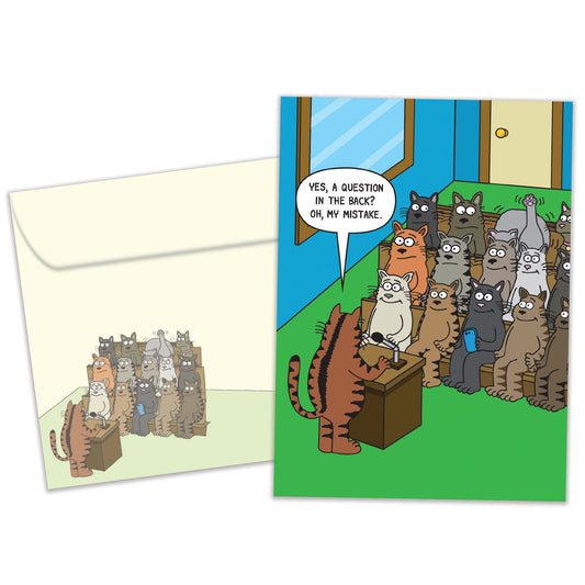Front view of a birthday greeting card featuring a humorous comic of cats in a classroom setting, with a matching envelope.