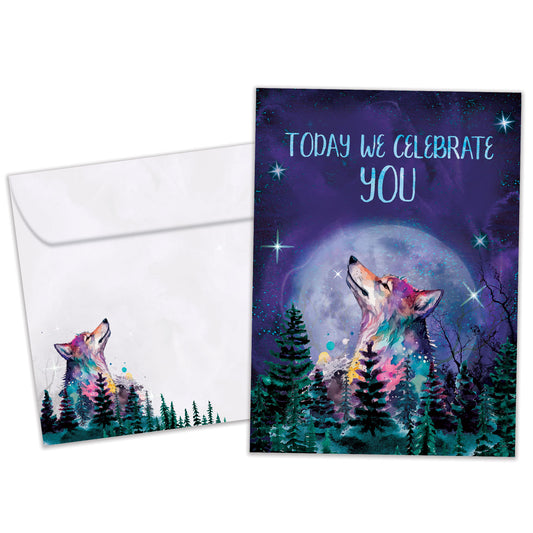 Front view of a Birthday greeting card featuring a wolf in a forest and moon in the background with a message, with a matching envelope