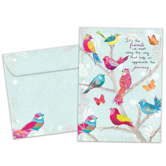 Front view of a Birthday greeting card featuring colorful birds and a message about friends we meet along the way, with a matching envelope.