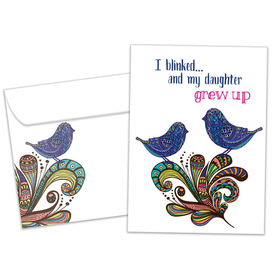 Front view of a Birthday greeting card featuring an illustration of 2 birds and the message "I blinked…and my daughter grew up", with a matching envelope