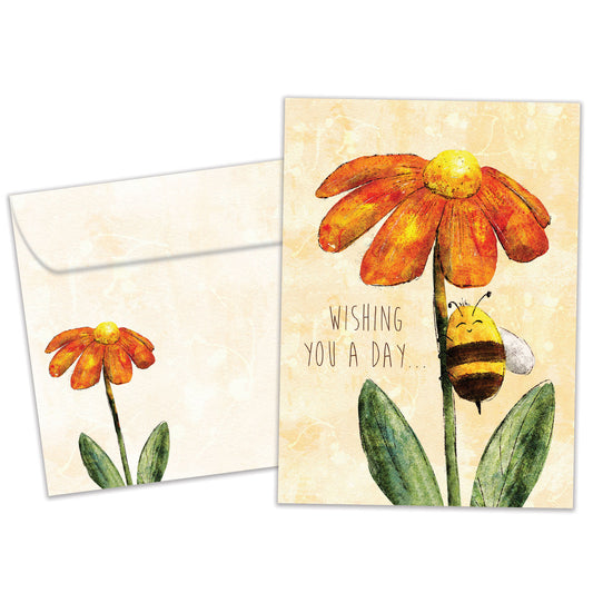 Front view of a Birthday greeting card featuring a smiling honey bee on a colourful flower, with a matching envelope.