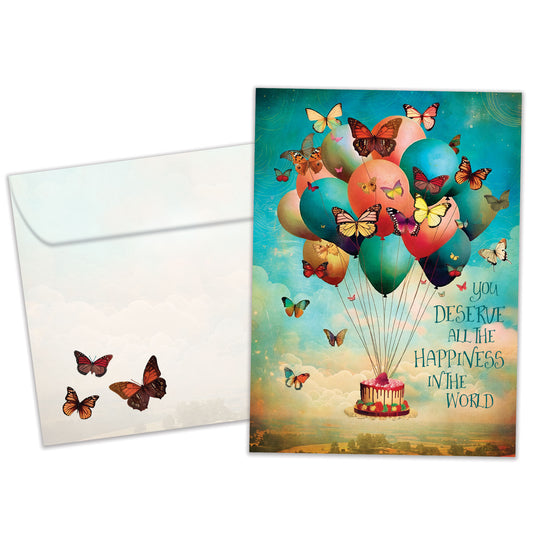 Front view of a Birthday greeting card featuring balloons floating a cake in the sky and butterflies, with a matching envelope
