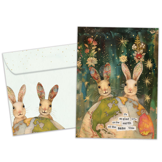 Front view of a Birthday greeting card featuring a two rabbits behind a colourful globe with an endearing message, with a matching envelope