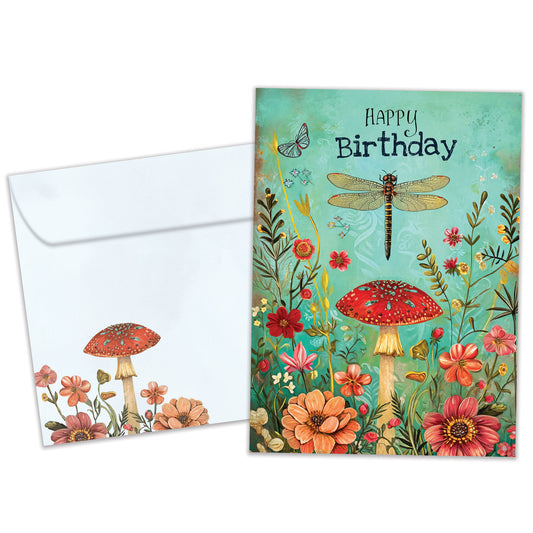 Front view of a Birthday greeting card featuring a whimsical floral design and dragonfly with the message "Happy Birthday", with a matching envelope.