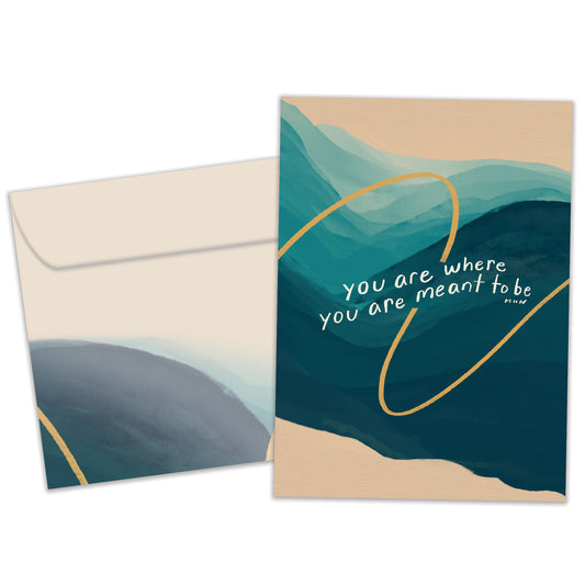 Front view of an All Occasion greeting card and matching envelope featuring the calming message 'You are where you are meant to be' on a serene background.