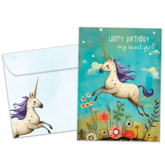 Front view of a Birthday greeting card featuring an illustration of a unicorn with a purple mane and surrounded by colorful flowers, with a matching envelope.