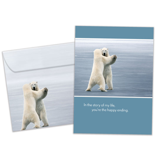 Front view of an Anniversary greeting card and matching envelope featuring an illustration of two polar bears dancing.