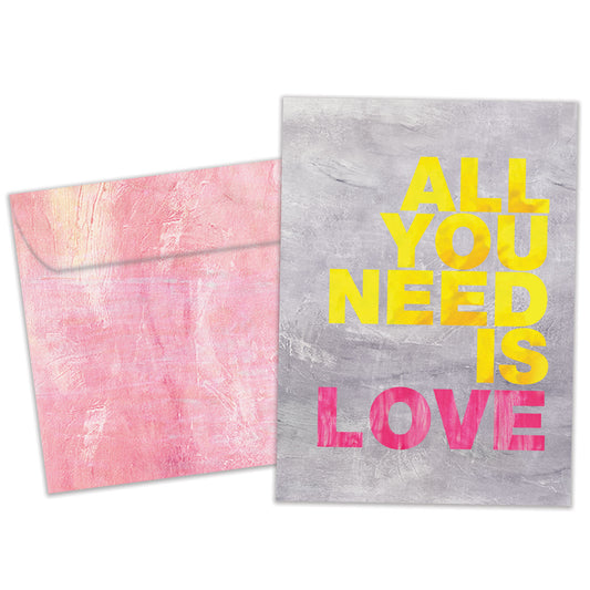 Front view of an Anniversary greeting card and matching envelope featuring the colourful message "All you need is love."