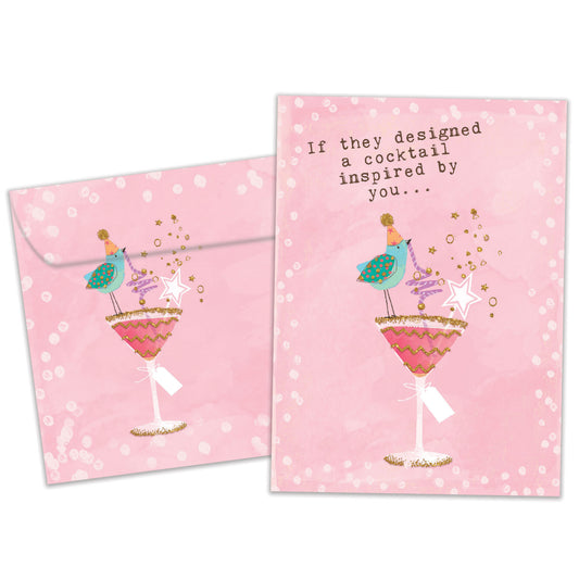 Front view of a Birthday greeting card featuring a bird sipping a cocktail with a pink background, with a matching envelope.