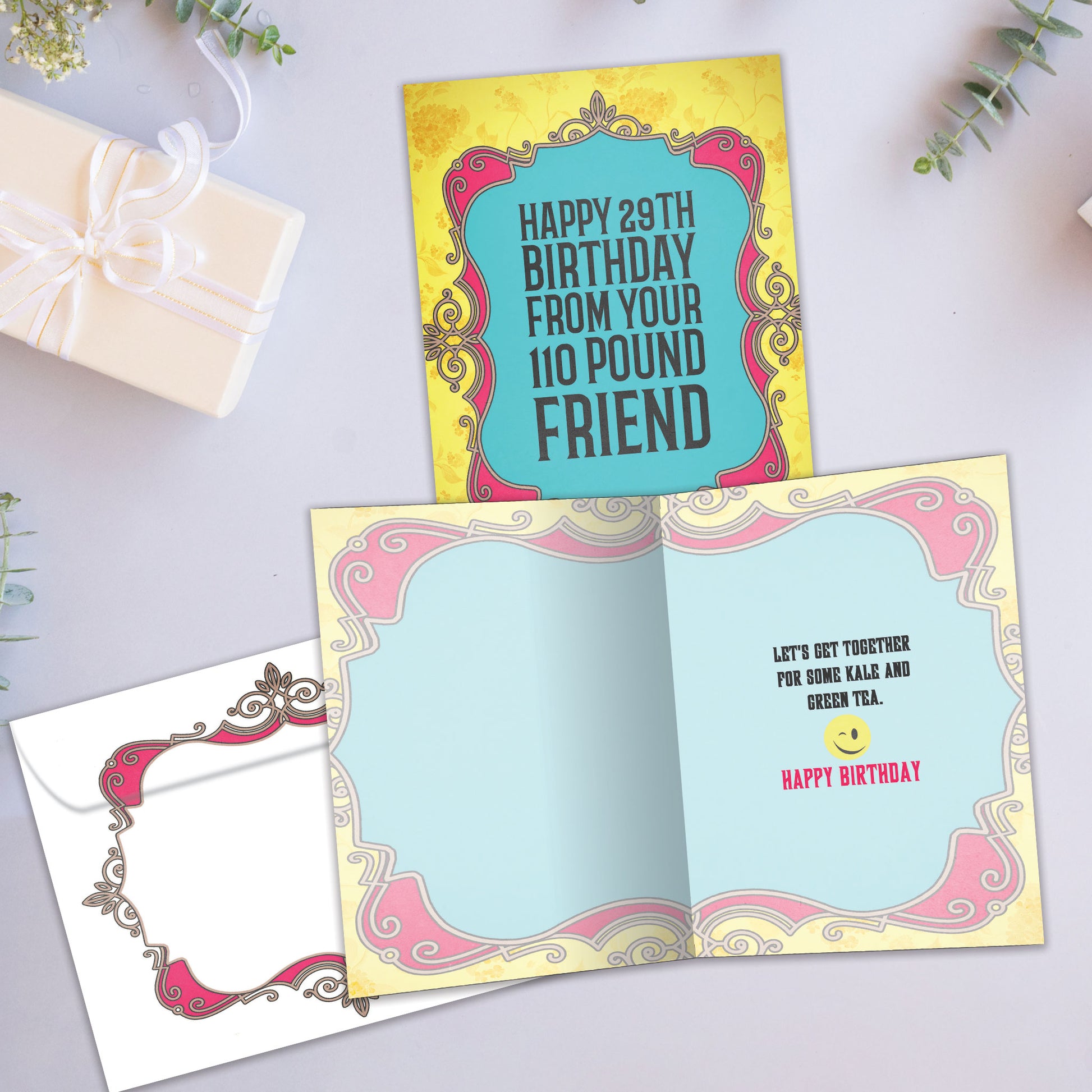 Front and inside view of a Birthday greeting card showcasing a colorful design with a message about being a 29-year-old and 110 pounds friend, with a matching envelope.