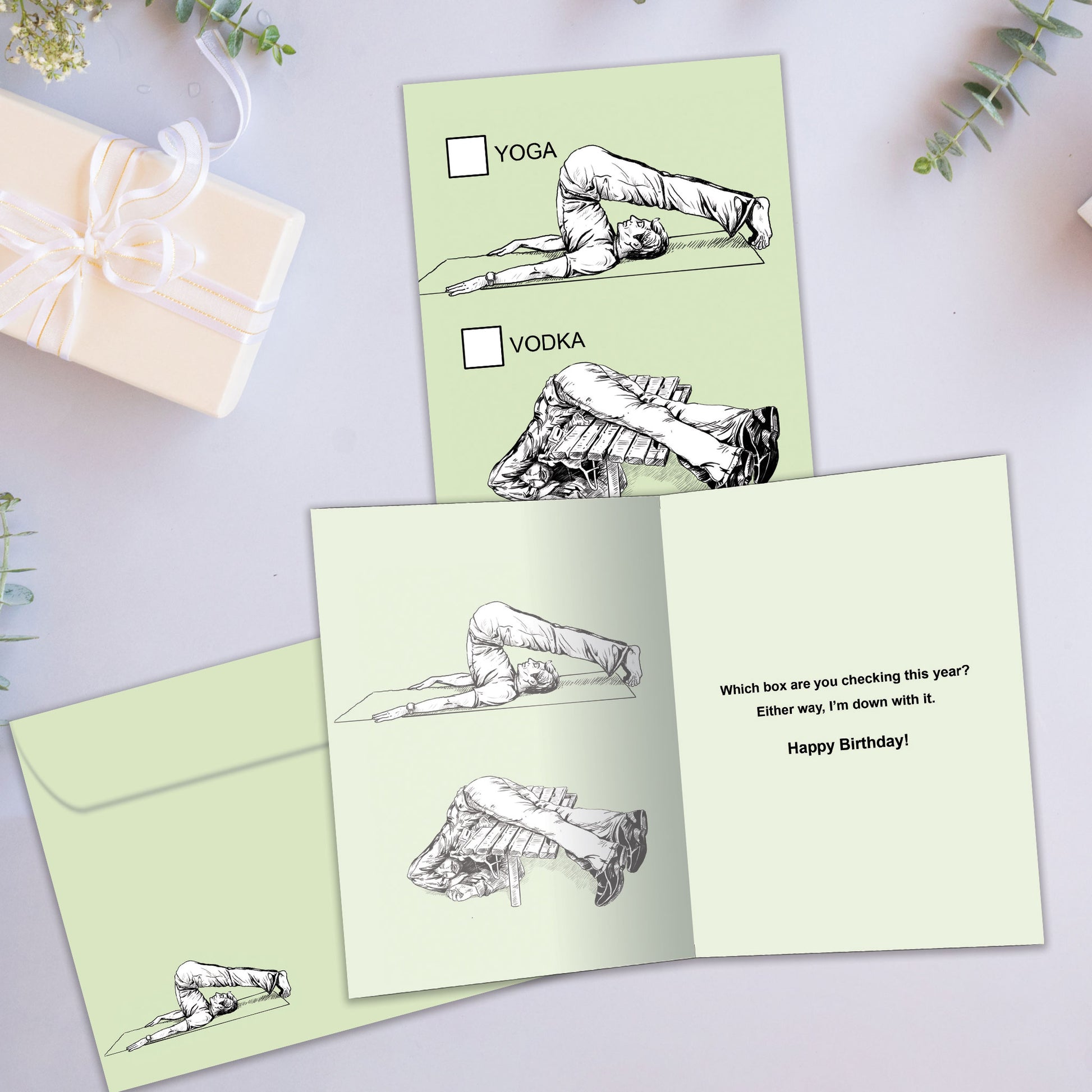 Front and inside view of a Birthday greeting card showcasing a sketch of doing yoga with vodka, with a matching envelope.