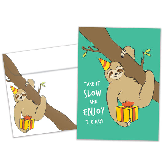 Front view of a birthday card featuring a sloth holding a present and the message "Take it slow", with a matching envelope.