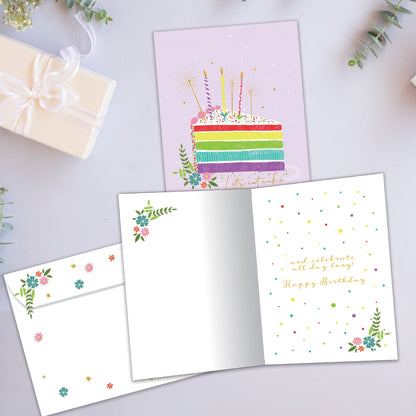 Front and inside view of a Birthday greeting card showcasing a colourful cake slice with the words "let's eat cake", with a matching envelope.