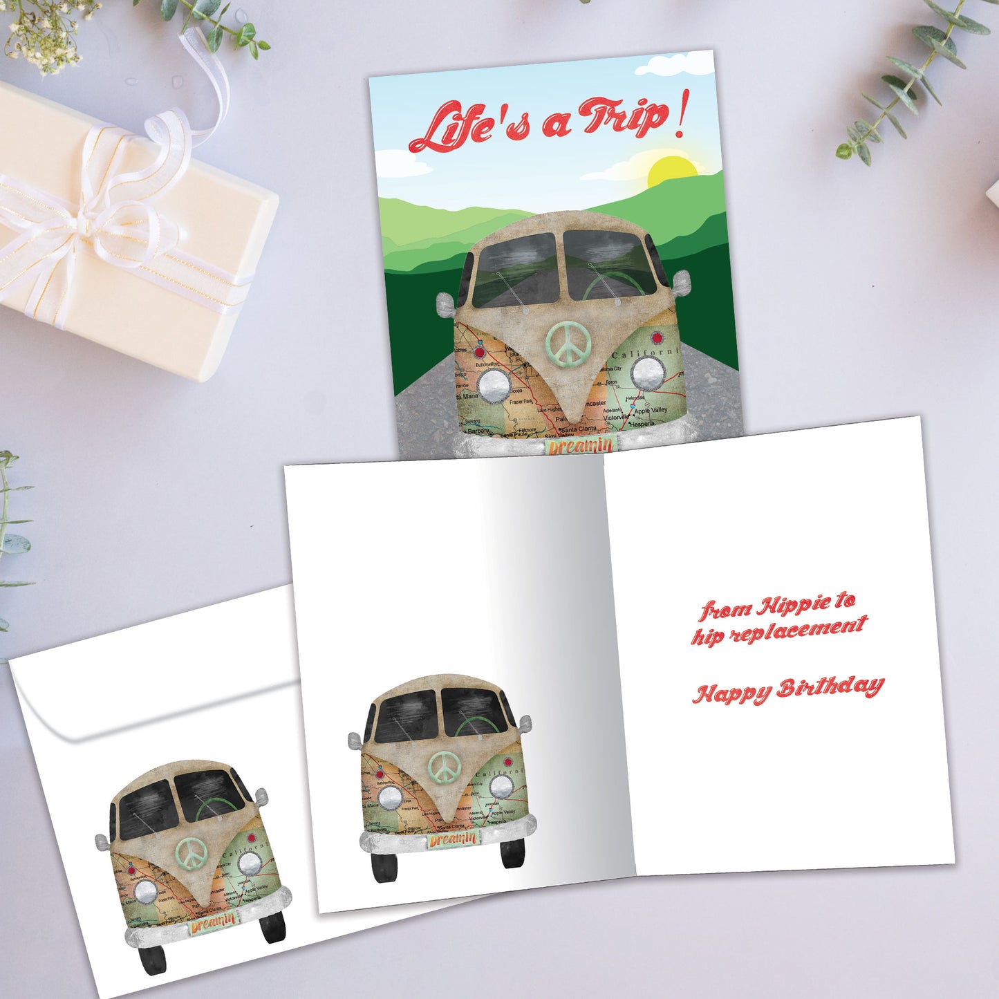 Front and inside view of a Birthday greeting card showcasing a peace van with the message "Life's a Trip!", with a matching envelope.