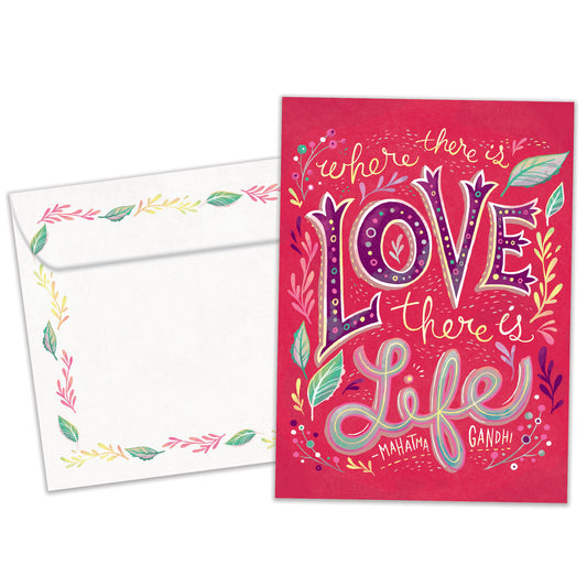 Front view of a Birthday greeting card featuring a pink background with the words "where there is love there is life", with a matching envelope.