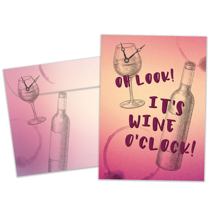 Front view of a Birthday greeting card featuring a sketch of a wine glass with a clock and the words "It's wine o'clock", with a matching envelope.