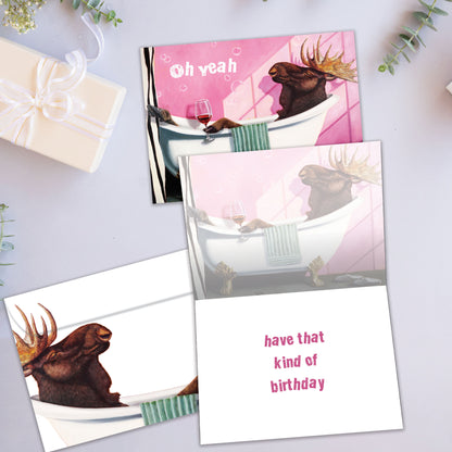 Front and inside view of a Birthday greeting card showcasing a moose relaxing in a bathtub, with a matching envelope.