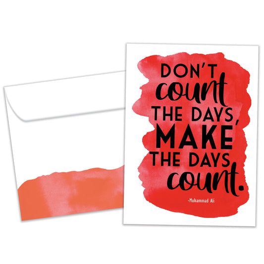 Front view of a Birthday greeting card featuring the words "don't count the days, make the days count" on a red background, with a matching envelope.