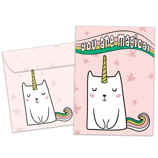 Front view of a Birthday greeting card featuring a unicorn cat with the words "you are magical" on a pink background, with a matching envelope.