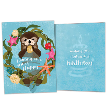 Front and inside view of a Birthday greeting card featuring a floating sea otter with a happy message, with matching design details inside.