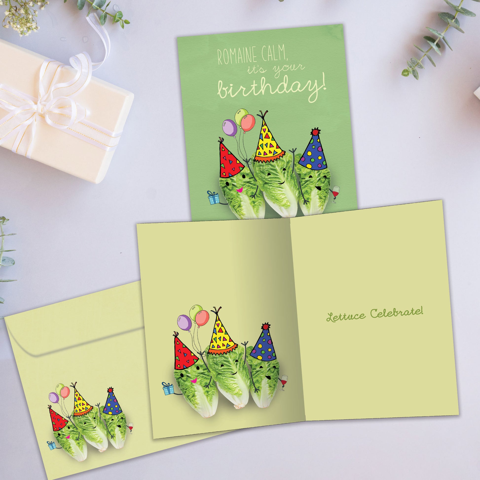Front and inside view of a Birthday greeting card showcasing romaine lettuce wearing party hats with a funny message, with a matching envelope.