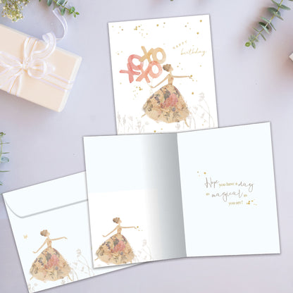 Front and inside view of a Birthday greeting card showcasing an illustration of a lady in a fancy gown with the message "happy birthday" and xoxo, with a matching envelope.