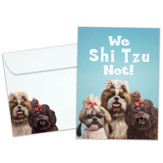 Front view of a Birthday greeting card featuring 3 dogs with the message "we Shi Tzu not!", with a matching envelope.