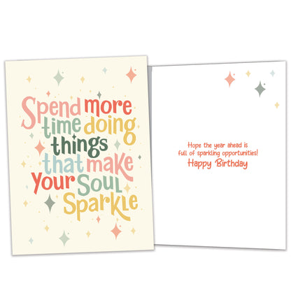 Front and inside view of a Birthday greeting card featuring the message "spend more time doing things that make your soul sparkle" on a light yellow background, with matching design details inside.