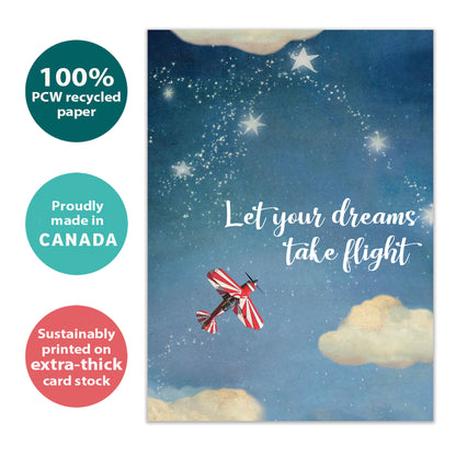 Front view of a Birthday greeting card with an airplane flying in the sky and the message "let your dreams take flight", highlighting its eco-friendly materials and made in Canada.