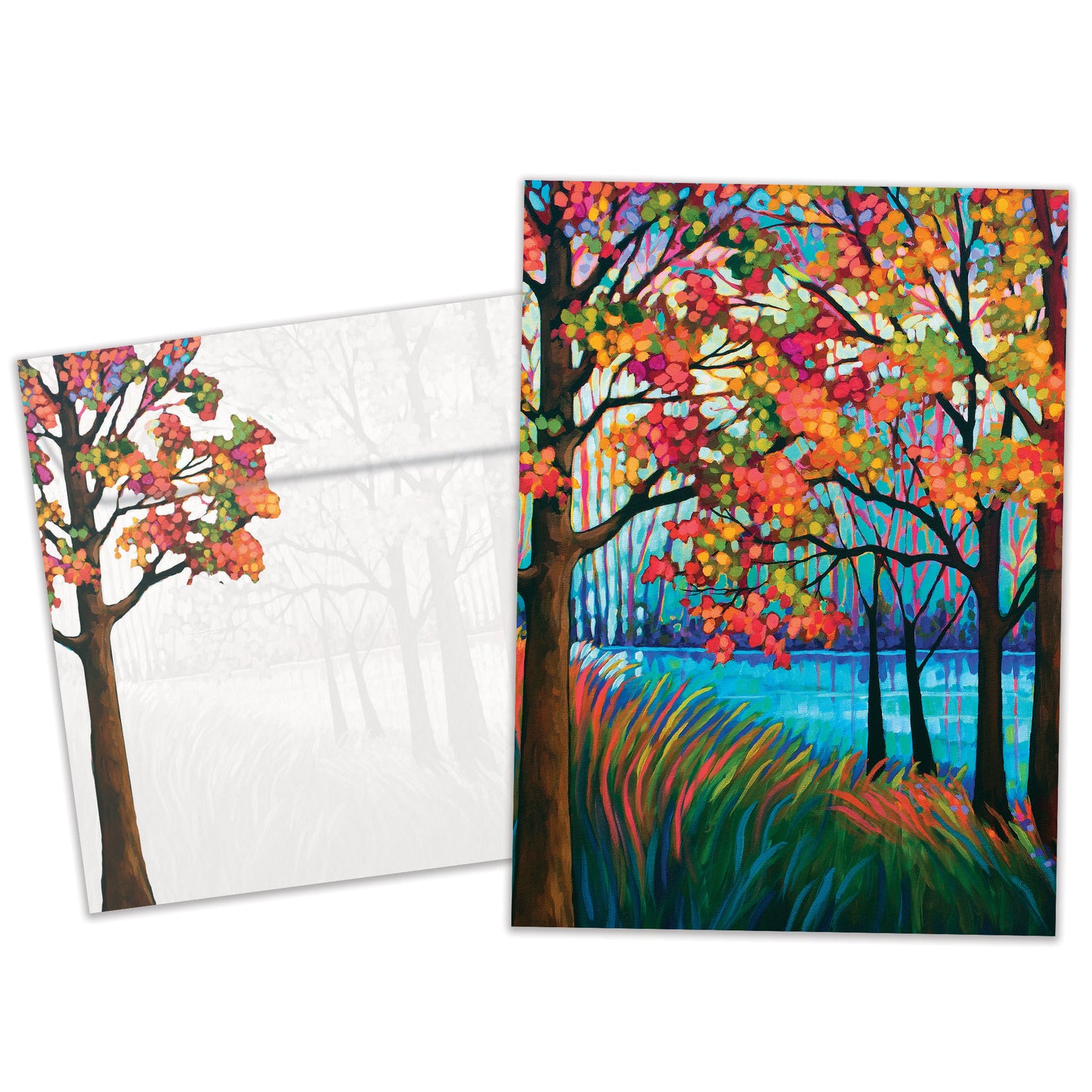 Front view of a birthday greeting card featuring a vibrant illustration of fall trees and a shimmering lake, with a matching envelope.