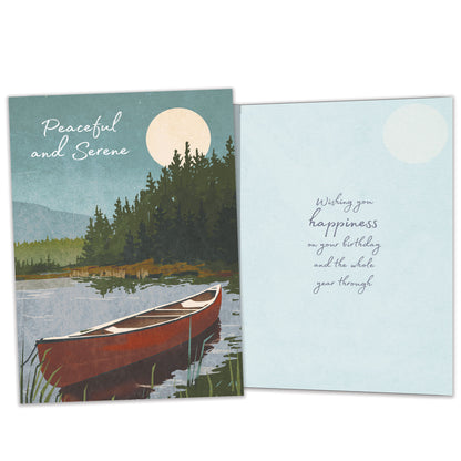 Front and inside view of a birthday greeting card featuring an illustration of a canoe on a lake with the message "Peaceful and Serene", with matching design details inside.