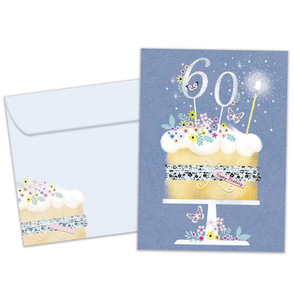 Front view of a Birthday greeting card featuring a birthday cake with 60 candles on a blue background, with a matching envelope.