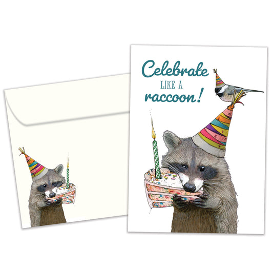 Front view of a Birthday greeting card featuring a raccoon eating cake with the message "Celebrate like a raccoon!", with a matching envelope