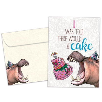 Front view of a Birthday greeting card featuring an image of a hippopotamus wearing a birthday cap about to eat cake, with a matching envelope