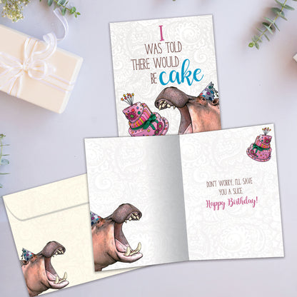 Front and inside view of a Birthday greeting card an image of a hippopotamus wearing a birthday cap about to eat cake, with a matching envelope