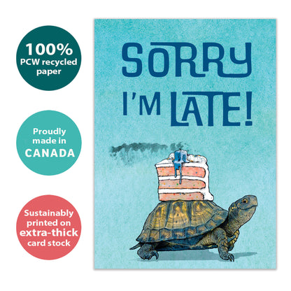 Front view of a Birthday greeting card featuring a turtle with a cake on it’s back, highlighting its eco-friendly materials and made in Canada