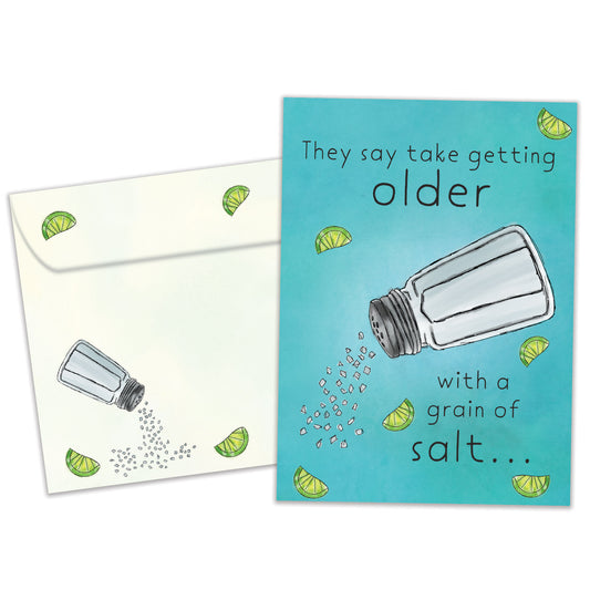 Front view of a Birthday greeting card featuring a salt shaker and a message about getting older, with a matching envelope