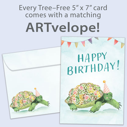 Front view of a Birthday greeting card featuring a flowery turtle with the message "Happy Birthday", with matching envelope artwork