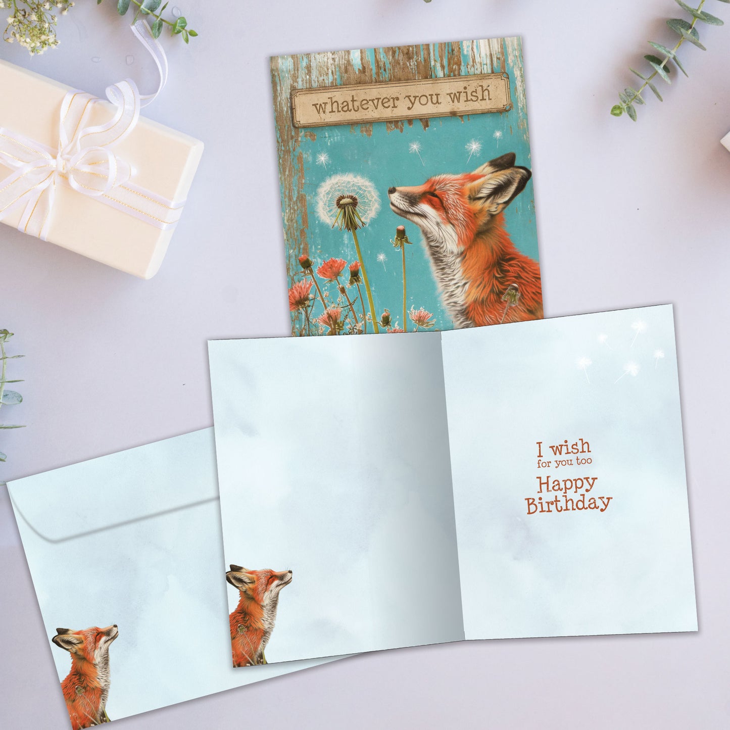 Front and inside view of a Birthday greeting card featuring a beautiful fox with the message "whatever you wish", with a matching envelope