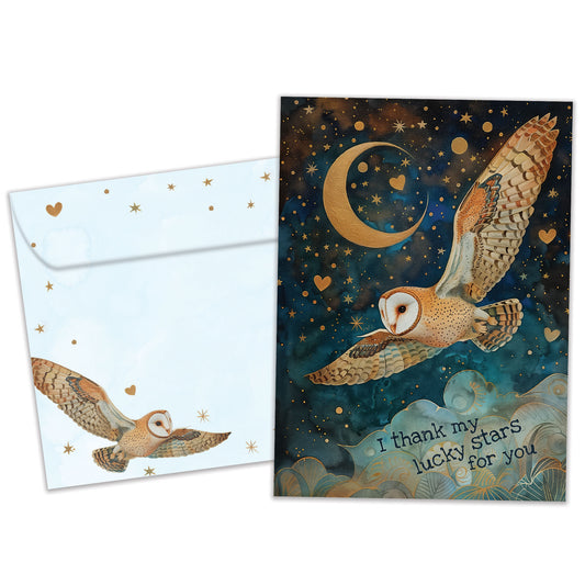 Front view of a Birthday greeting card featuring an owl flying at night with the message "I thank my lucky stars", with a matching envelope.