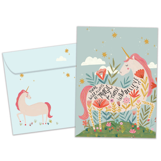 Front view of a Birthday greeting card featuring an illustration of a magical unicorn with a message about magic and believing, with a matching envelope.