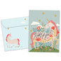 Front view of a Birthday greeting card featuring an illustration of a magical unicorn with a message about magic and believing, with a matching envelope.