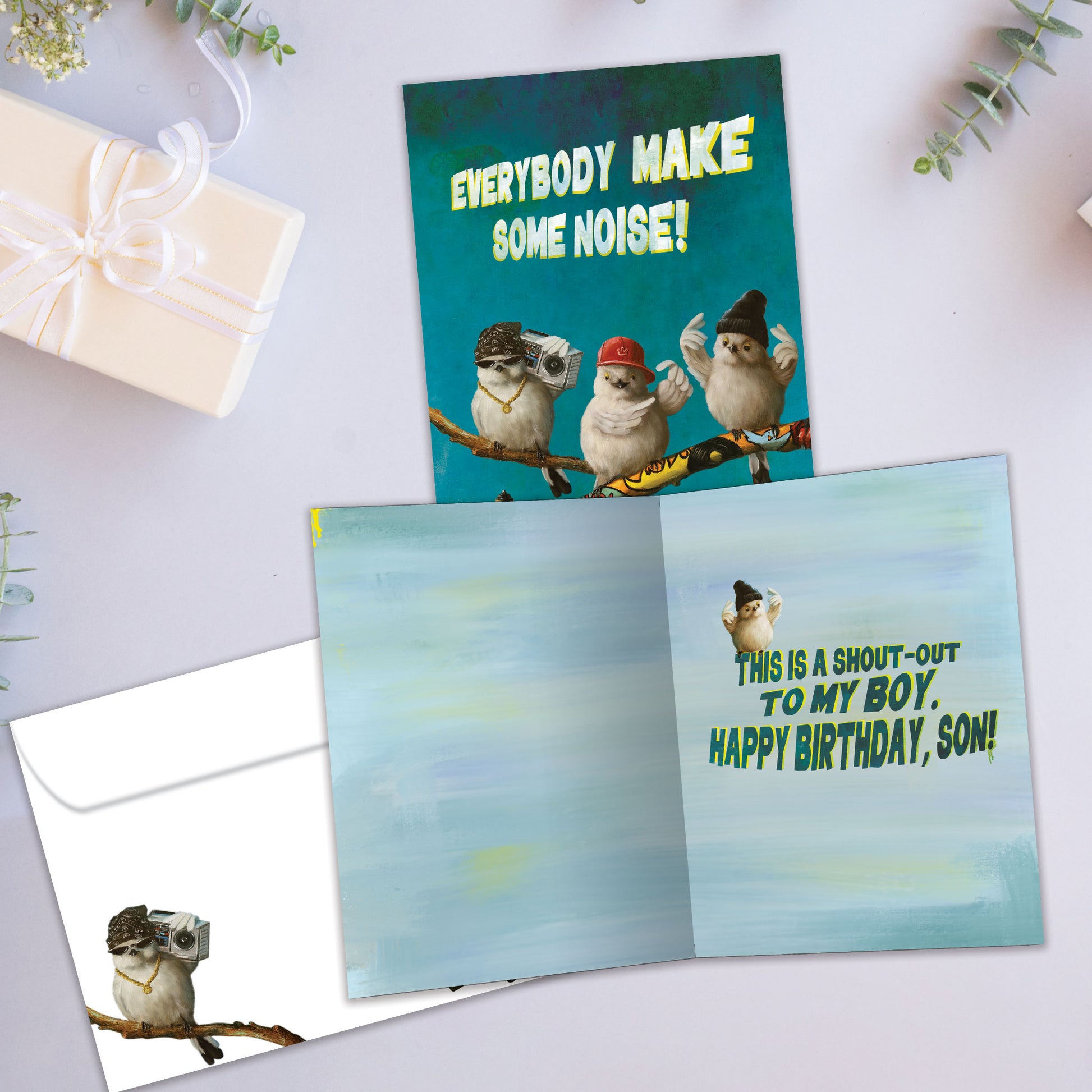 Front and inside view of a Birthday greeting card showcasing birds dancing on a branch with a matching envelope